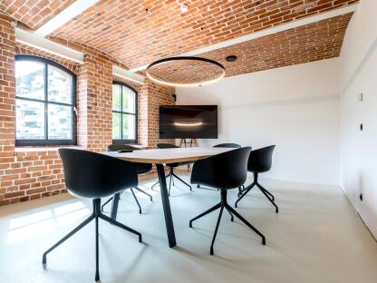Din conference table with barrel shaped linoleum tabletop, design & planning: Spaceworks GmbH, photographer: Joachim Wagner