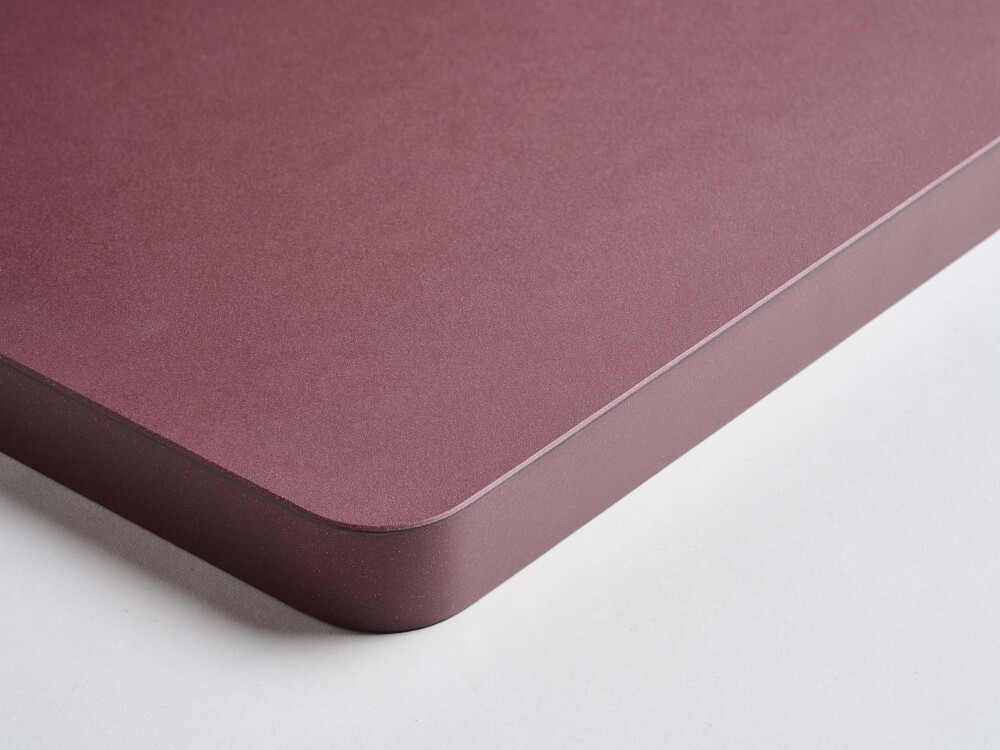 Faust table top in burgundy with a matt linoleum surface and colour-coordinated, rounded linoleum edge.