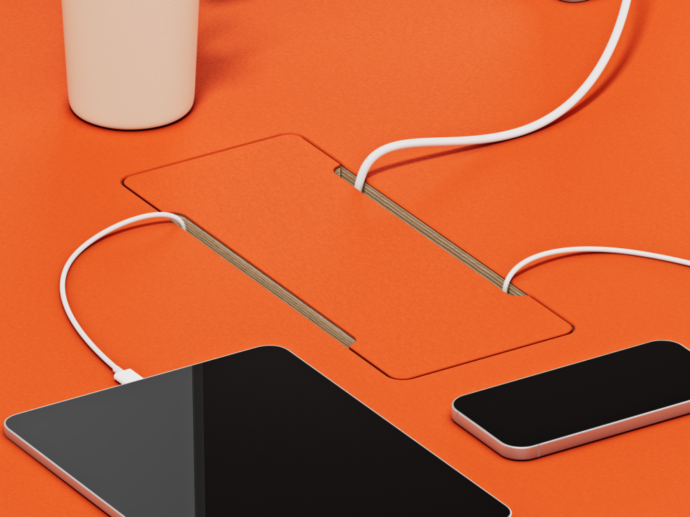 Rechteckiger Linoleum-Kabeldeckel eingelassen in Linoleum-Tischplatte.