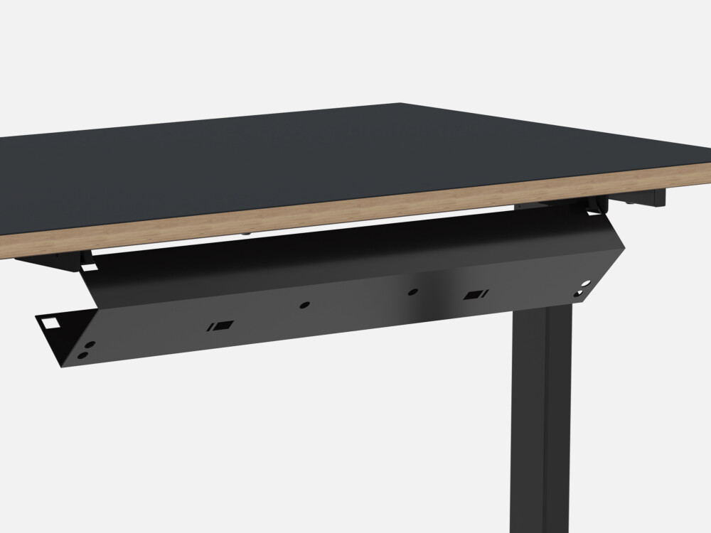 Kabelkanal von Faust aus pulverbeschichtetem Stahlblech, klappbar durch Klickmechanismus, unter Hubert-Tischgestell montiert.