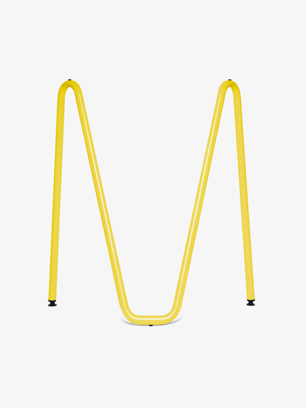 Sinus Tischbock in Größe M in Zinkgelb, auf hellem Hintergrund stehend.