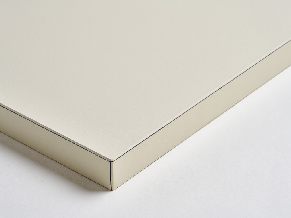 Table top from Faust with matt linoleum surface in Mushroom and ABS edge in the same color - close-up of the surface.