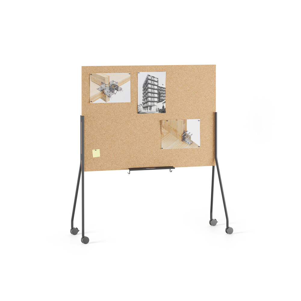 WALL Cork notice board with black storage rail and black legs on castors, with some pictures and notes pinned to it